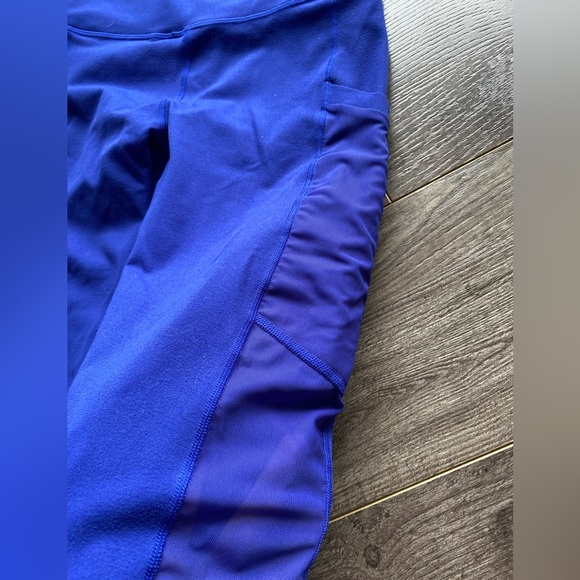 Fabletics Powerhold Royal Blue Cropped Leggings w/ mesh side cutout and pockets - Picture 2 of 8